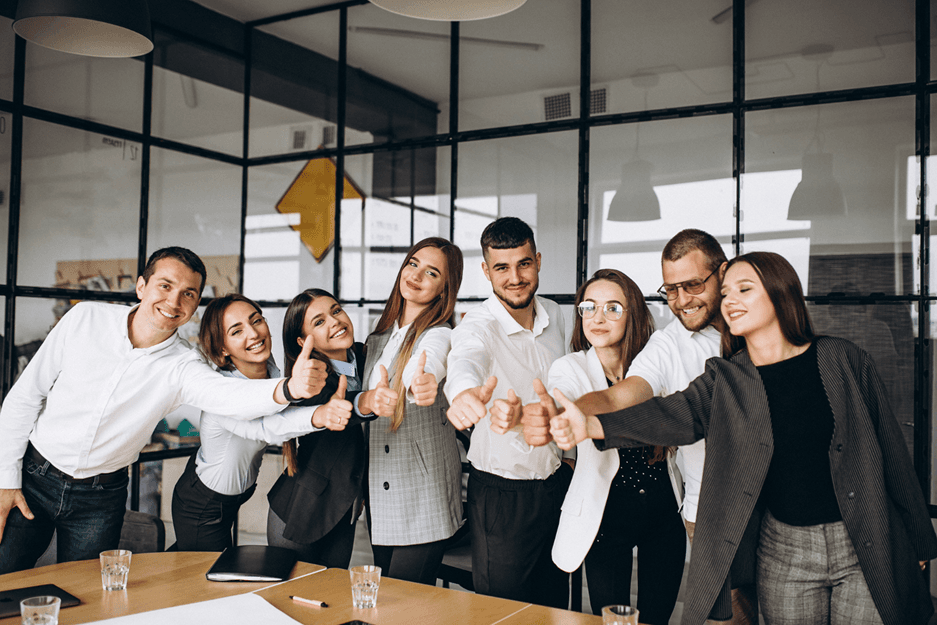 Axis PeopleX team celebrating together in the office